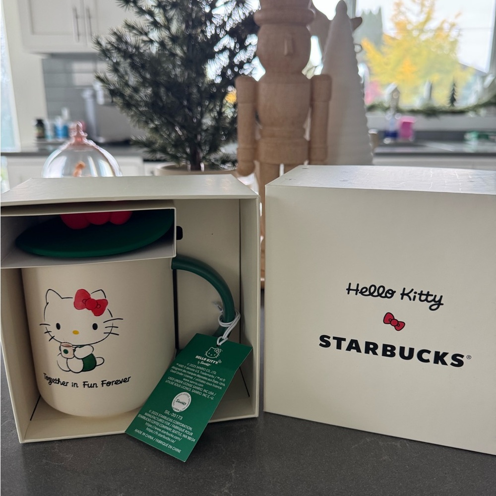 Starbucks Hello Kitty Mug with Red Bow and Green Handle